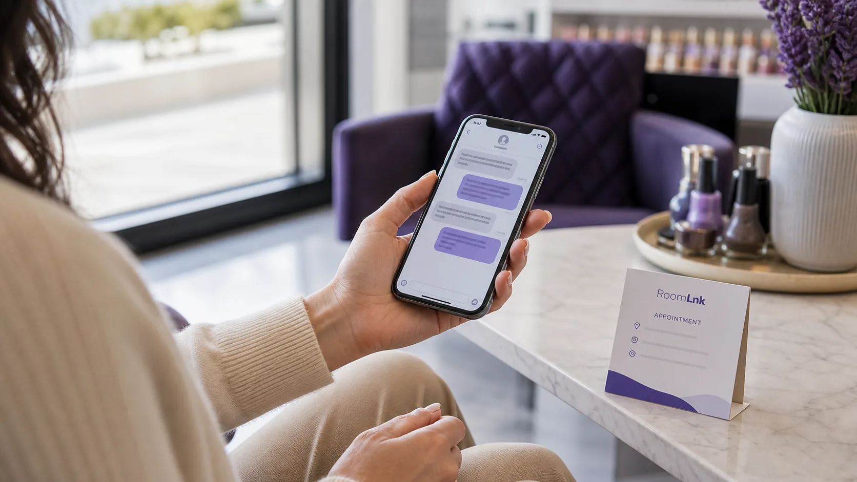 Nail salon client viewing a browser conversation before an appointment