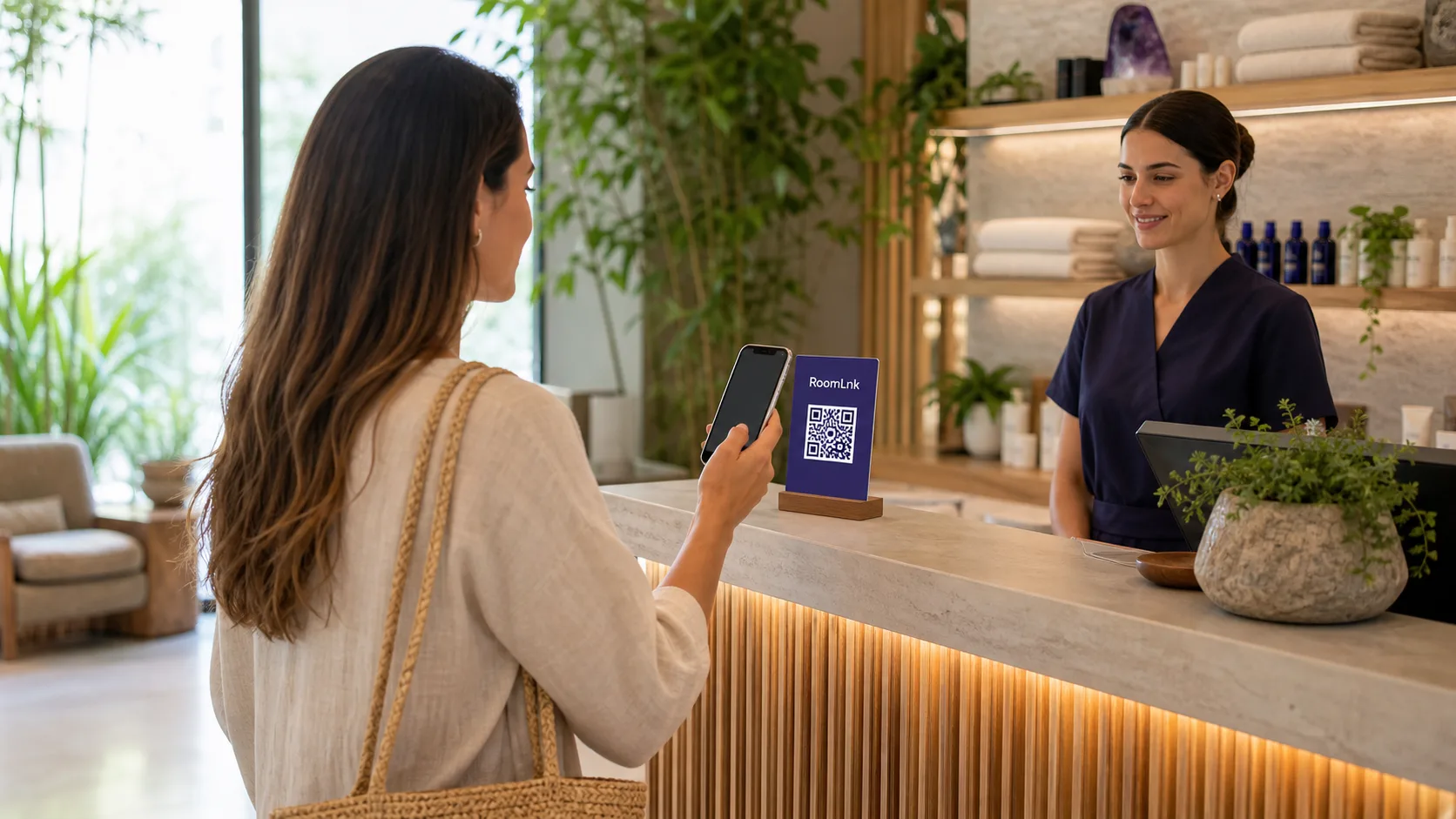 Spa client scanning a RoomLnk QR code at reception